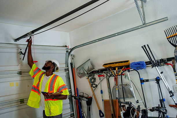 Professional Garage Door technician working in Wellston, MO